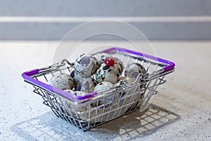 Variegated quail eggs with small brown specks