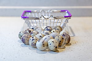 Variegated quail eggs with small brown specks