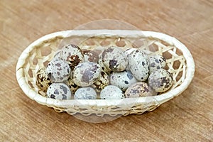 Variegated quail eggs with small brown specks