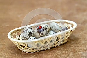 Variegated quail eggs with small brown specks