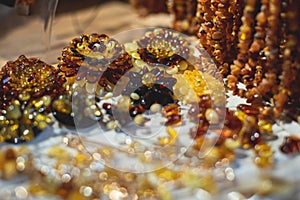 Variety assortment of souvenirs made of amber, traditional tourist souvenirs and gifts from Kaliningrad, Russia, in local vendor