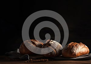A Variety of Bread Loaves with Dark Space for Text