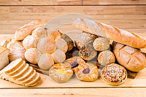 A variety of breads are arranged together, the appearance and color are different. Extremely appetizing