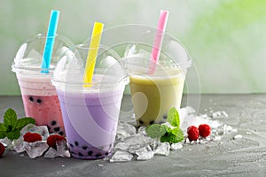 Variety of bubble tea in plastic cups