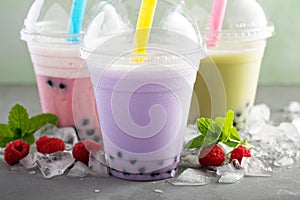 Variety of bubble tea in plastic cups