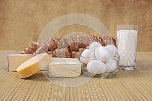 Variety Of Cheeses, Bread, Milk And Eggs