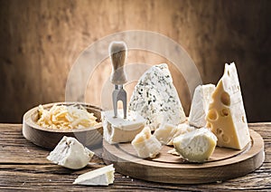 Variety of cheeses. Vintage stiles