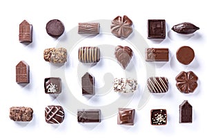 Variety of chocolate pralines, symmetrical isolated on white background. .sweet and chocolate concept