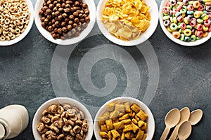 Variety of cold cereals in white bowls