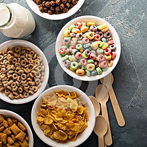 Variety of cold cereals in white bowls