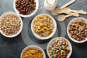 Variety of cold cereals in white bowls