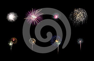 Variety of colorful fireworks isolated on black background