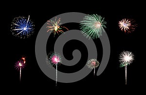 Variety of colorful fireworks isolated on black background