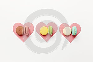 Variety of colorful french sweet dessert macarons with different fillings