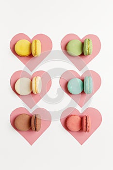 Variety of colorful french sweet dessert macarons with different fillings