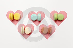 Variety of colorful french sweet dessert macarons with different fillings