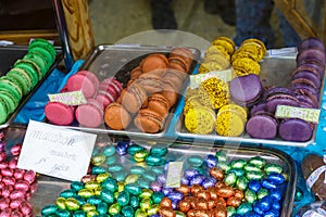 Variety of colorful macaroons cookies on the counter in Chamonix France