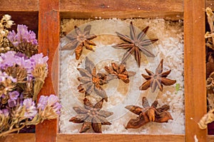 Variety of condiments and flavorings in the wooden box