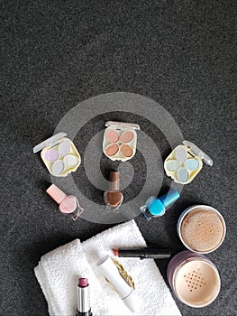 variety of cosmetics and beauty products, seen from above