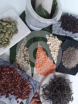 Variety of dal in India on a plain white background