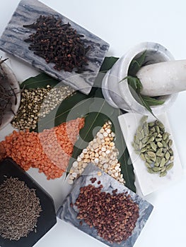 Variety of dal in India on a plain white background