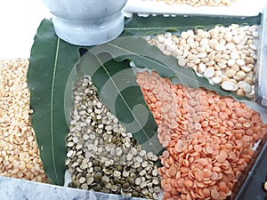 Variety of dal in India on a plain white background