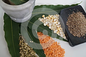 Variety of dal in India on a plain white background