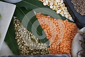 Variety of dal in India on a plain white background