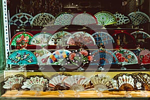 A variety of different Spanish hand fans on display for sale, Sevilla Seville , Andalucia, Spain