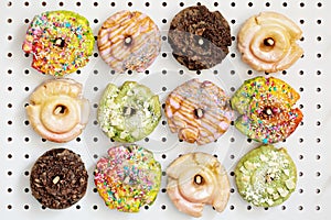 Variety of donuts on a peg board