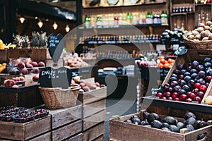 Variety of fresh fruit and vegetables on sale at a market.
