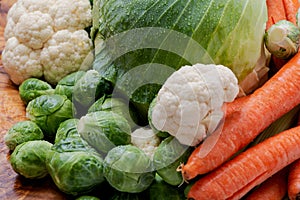 A variety of fresh Organic Vegetables including Carrots, Cabbage, Cauliflowers, Brussels sprouts.