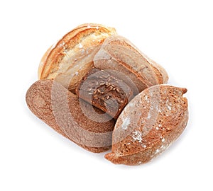 Variety of fresh tasty bread on white background