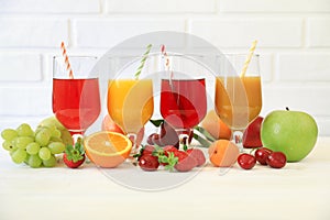 Variety of fruit juices and fruits, juice vitamin bar concept.