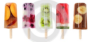 Variety of fruit popsicles isolated on white