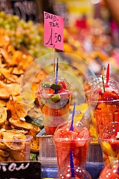 Variety of fruit salad in La Boqueria market in Barcelona. photo