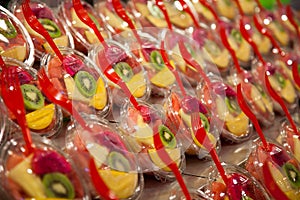 Variety of fruit salad in La Boqueria market photo