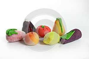 Variety of fruits on colorful marzipan photo