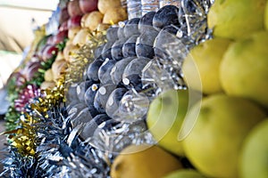 Variety of fruits on market booth in Marrakech, Morocco