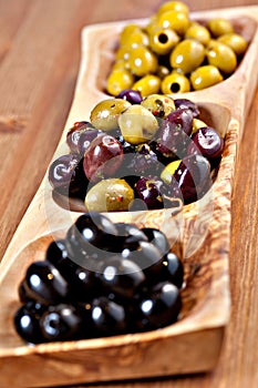 Variety of green, black and mixed marinated olives