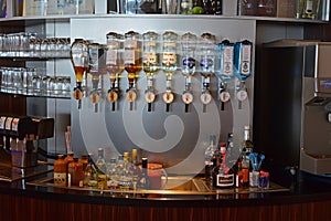 Variety of Hard Liquor bottles at bar counter