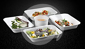 A variety of healthy and delicious meal options packed in eco-friendly containers for a convenient and sustainable way to eat