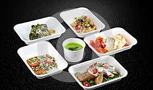 A variety of healthy and delicious meal options packed in eco-friendly containers for a convenient and sustainable way to eat