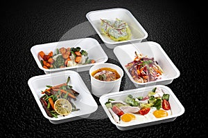 A variety of healthy and delicious meal options packed in eco-friendly containers for a convenient and sustainable way to eat