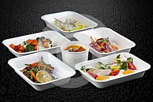 A variety of healthy and delicious meal options packed in eco-friendly containers for a convenient and sustainable way to eat