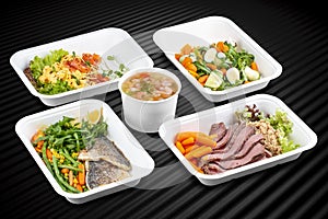 A variety of healthy and delicious meal options packed in eco-friendly containers for a convenient and sustainable way to eat