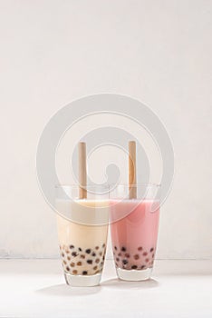 Variety of homemade bubble tea/ boba tea with tapioca pearls on white background