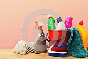 Variety of house cleaning products on table