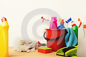 Variety of house cleaning products on table