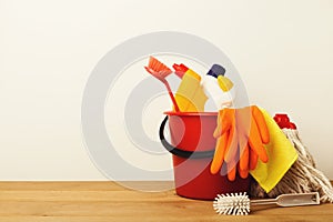 Variety of house cleaning products on table